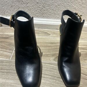 Salvatore Ferragamo Black Leather Slingback Mules with Gold Buckle